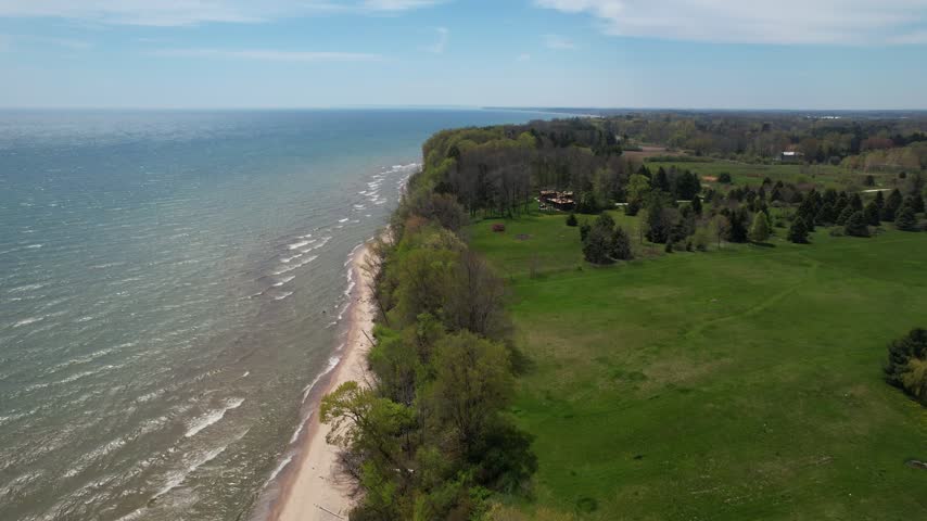
Fast Rise Coast Line Aerial of Silver Creek Park in Manitowoc Wisconsin on the Shore of Lake Michigan