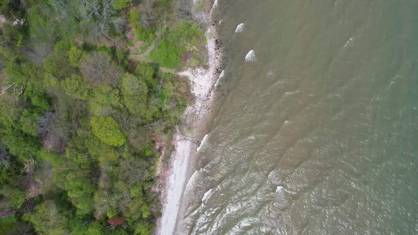 
Descending on Coast Waves.  Aerial of Silver Creek Park in Manitowoc Wisconsin on the Shore of Lake Michigan