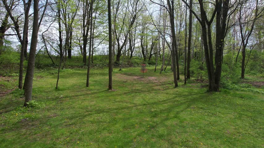 
Approaching Disc Golf Goal.  Aerial of Silver Creek Park in Manitowoc Wisconsin on the Shore of Lake Michigan