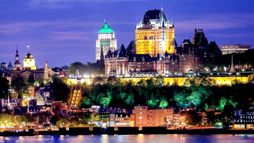 Aerial view of Quebec City, Quebec, Canada, showcasing its historic architecture, charming old town, distinctive rooftops, and beautiful urban skyline. This footage captures the city’s European-inspired character, rich cultural heritage, and scenic atmosphere, ideal for travel, tourism, and historical documentaries.