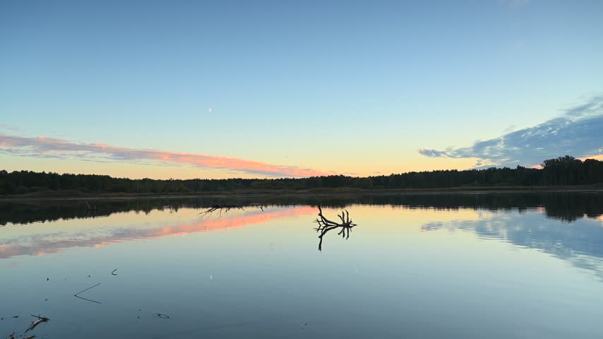 Autumn landscape, forest lake, forest in background, trees, dark, sunset light, sunset sky,branches in the water
