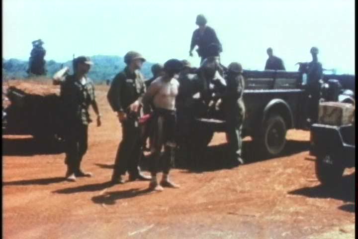 1960s - A group of soldiers find a wrecked plane and salvage it for parts during the Vietnam War