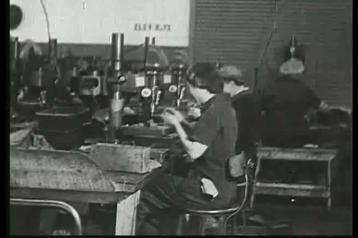 1910s - Women are taught how to operate machinery for work during World War 1