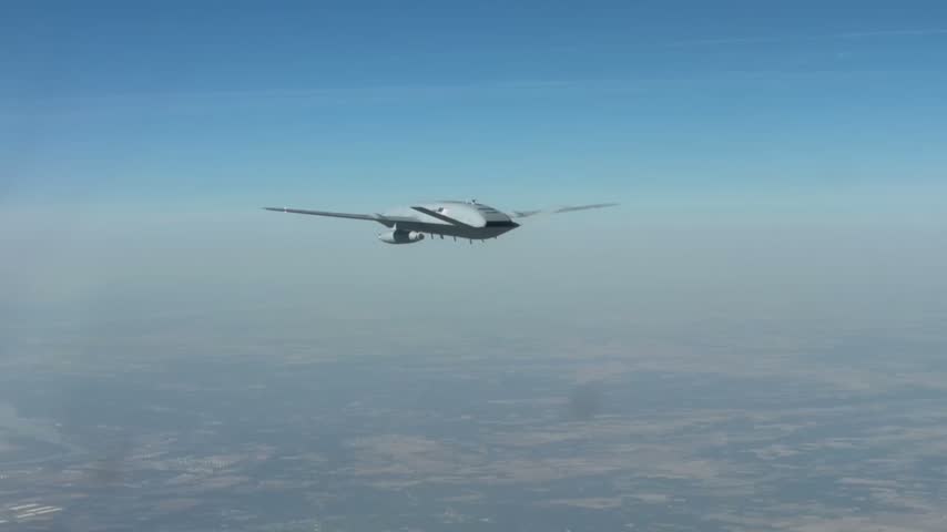 The unmanned refueling aircraft MQ-25A Stingray is doing a test flight.