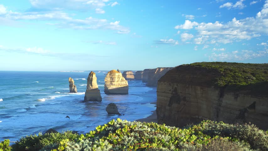 Magical dreamlike seascape at sunrise with golden light over the Twelve Apostles, Great Ocean Road, Victoria