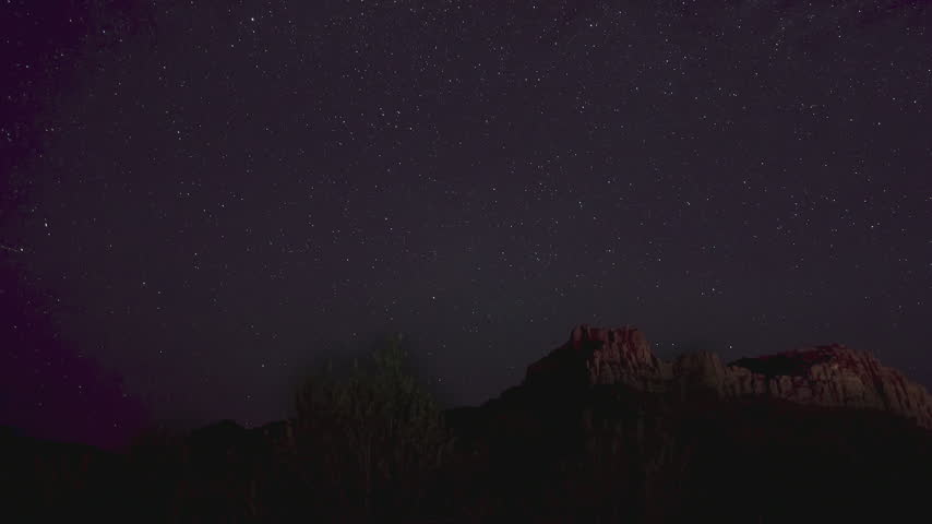 Time-lapse of stars over the mountains of Zion National Park in Utah.