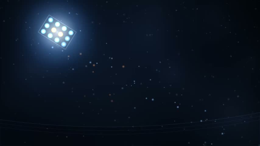 A high-angle view of a powerful stadium light fixture illuminating the night sky, surrounded by distant stars and faint atmospheric light trails.