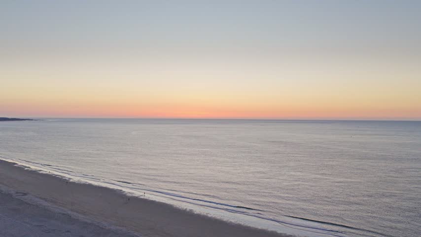 Stunning aerial drone sunset over the North Sea coast in Zeeland, Netherlands