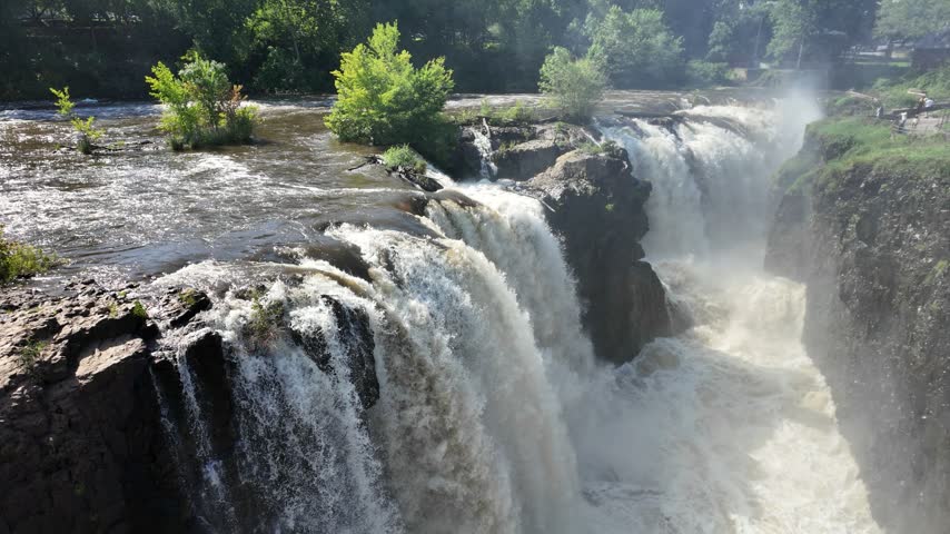 Panning from Paterson Great Falls to a green viewing path