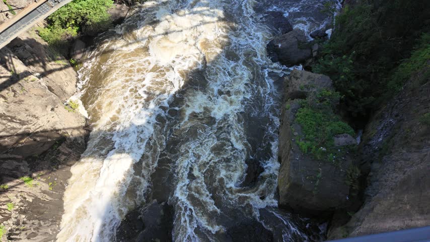 Rapids flowing over rocks at Paterson Great Falls in New Jersey