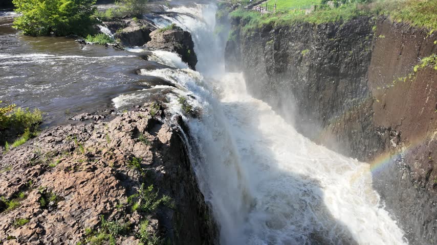 Powerful water rushing down the rocky gorge at Paterson Great Falls