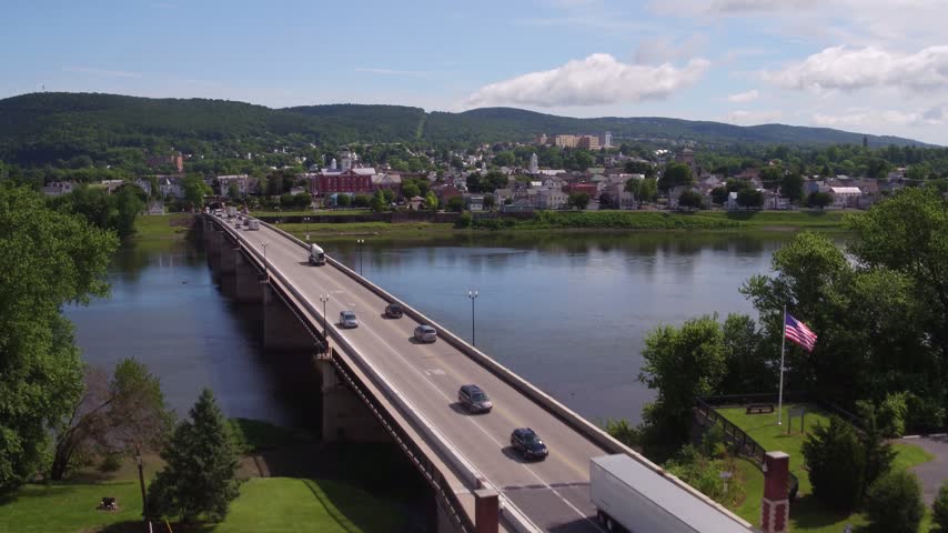 Bridge Over a River Toward a Pennsylvania Town during Mid Day