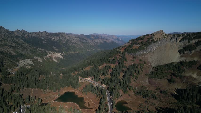 Top Down Drone Aerial View of Mountain Lakes and Winding Road in Mount Rainier National Park, Washington
