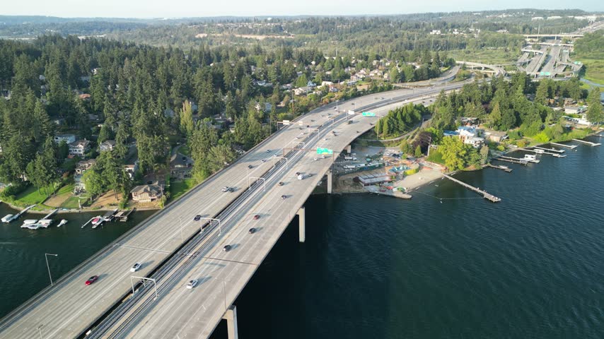 Aerial View of I-90 Bridge Spanning Lake Washington with Scenic Waterfront and Residential Area