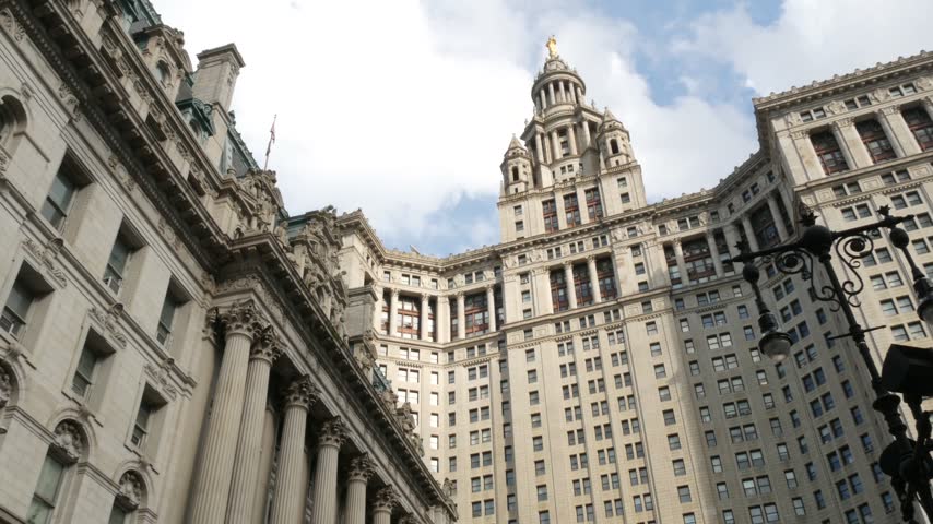 New York City Downtown Civic Center, United States of America. Manhattan municipal building 1914, old historic architecture. Government administration authority. Low angle view from Chambers street.
