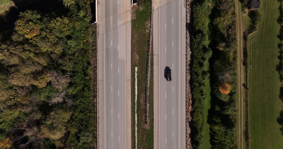 Aerial view of highway with cars driving through rural landscape in Washington Court House, Ohio, United States.