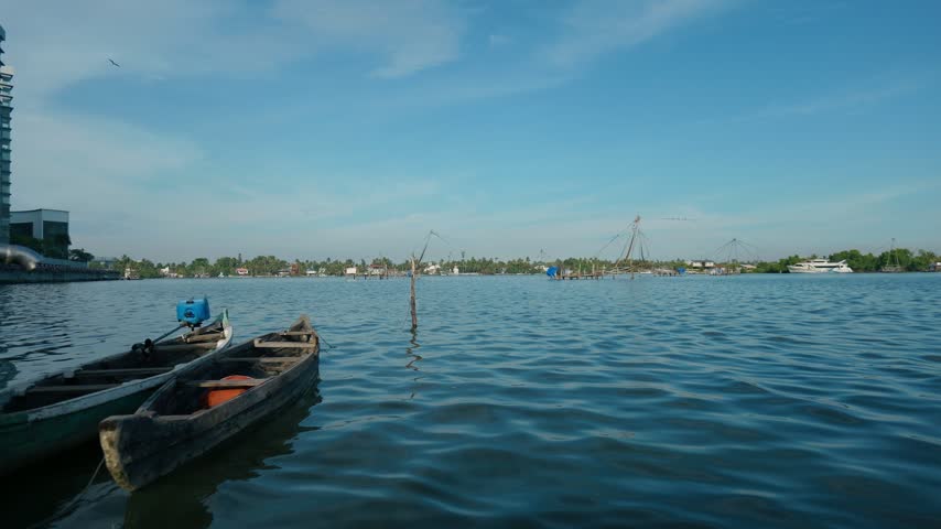Boat in blue lake with blue sky with cool breeze sunny day