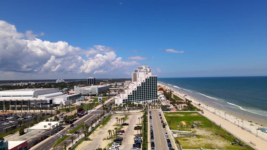 Beachfront hotels line the sandy coastline beside the Atlantic Ocean in Daytona Beach.