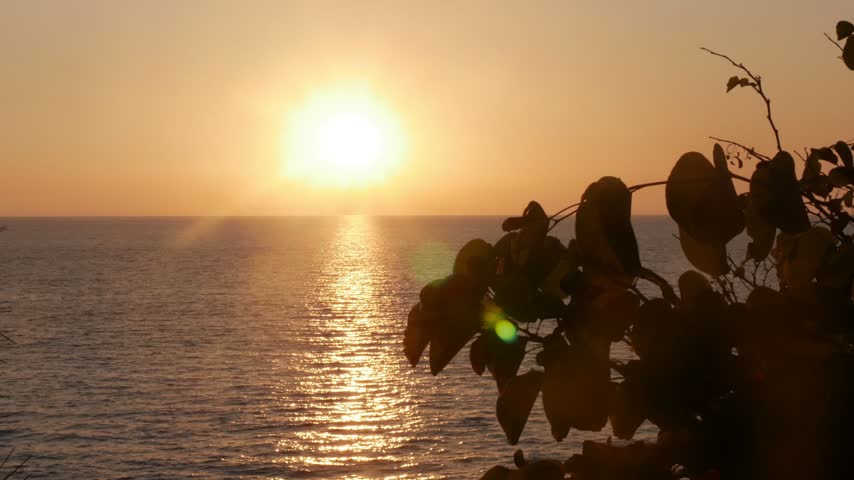 Beautiful Red Sunset on the Sea. Summer Tropical Sunset Sea View. Beautiful Seascape, Red Dusk on the Ocean.