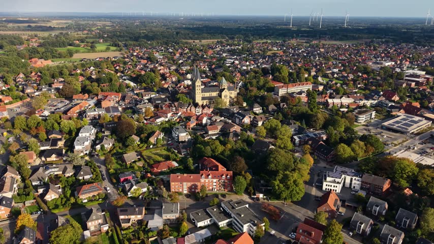 Aerial view around the old town of the city Neuenkirchen 49586 in Germany, Niedersachsen  on a sunny autumn noon.