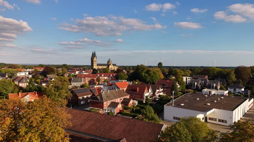 Aerial view around the old town of the city Neuenkirchen 49586 in Germany, Niedersachsen  on a sunny autumn noon.