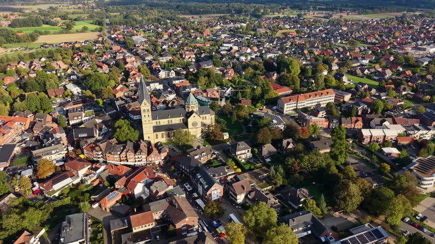 Aerial view around the old town of the city Neuenkirchen 49586 in Germany, Niedersachsen  on a sunny autumn noon.