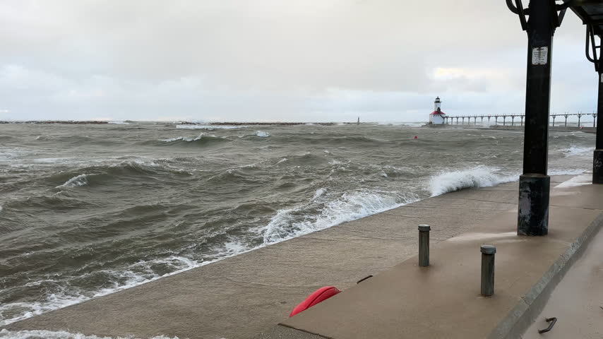 Gale Force Winds Whipping Large Waves on the Lake Michigan Coast in Michigan City, Indiana 