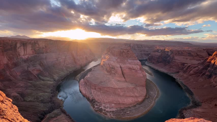 Scenic horseshoe bend panorama with colorado river at sunset