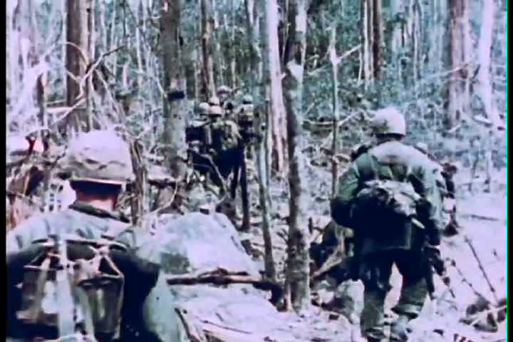 1960s - The fourth infantry division battles enemy forces during the Vietnam War