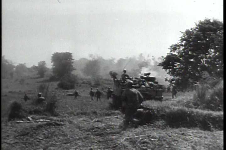 1940s - The 6th infantry division battles Japanese soldiers in the Philippines during World War 2