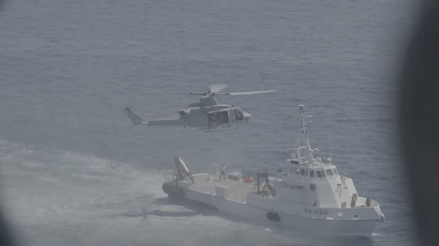 US Marines are carrying out a ship seizure offshore.