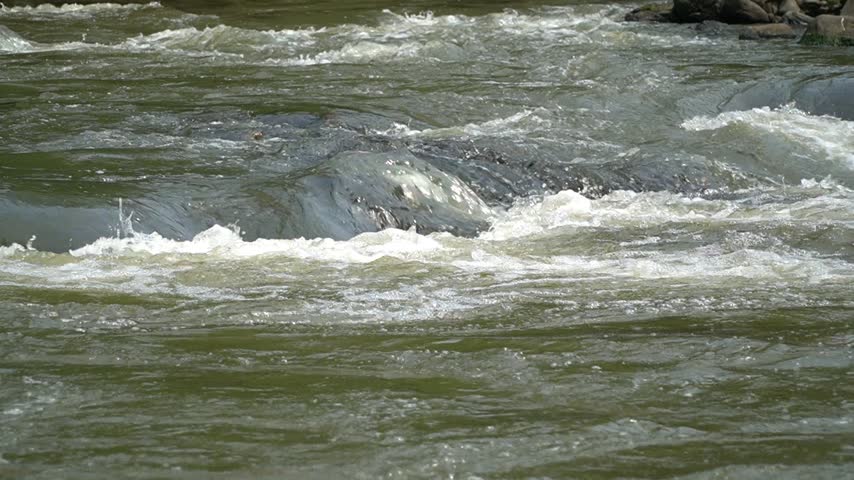water flowing into the river