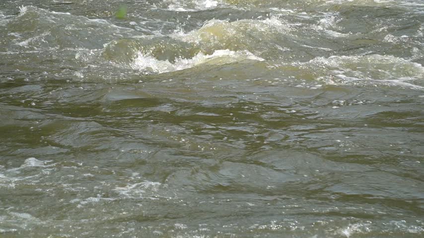 water flowing into the river