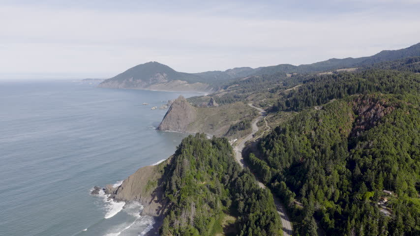 Beautiful Oregon Coast with winding highway 101, drone view.