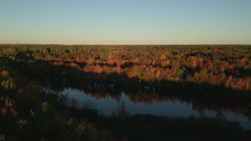 Ponds And Surrounding Parkland During Autumn Over Parc des Étangs Antoine-Charlebois Near Sainte-Julie, Quebec, Canada. Aerial Drone Shot