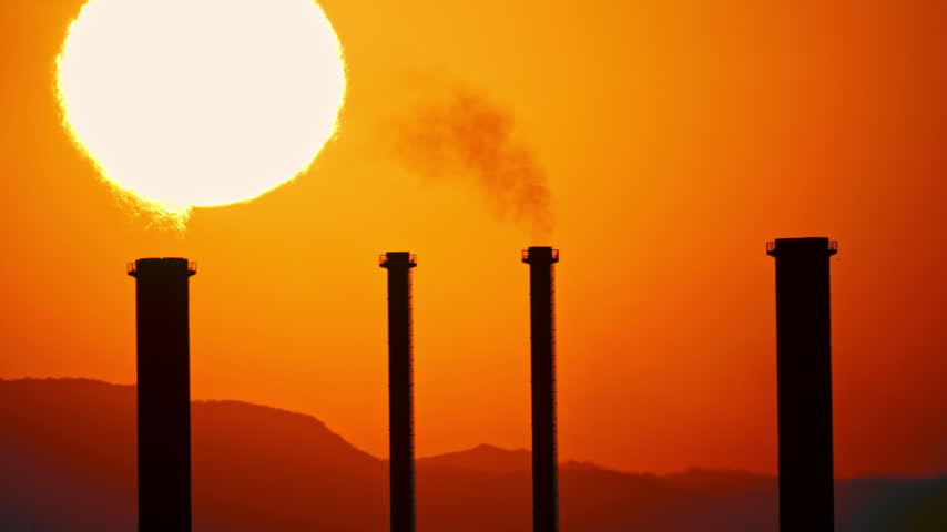 Sunset behind power station in Cyprus