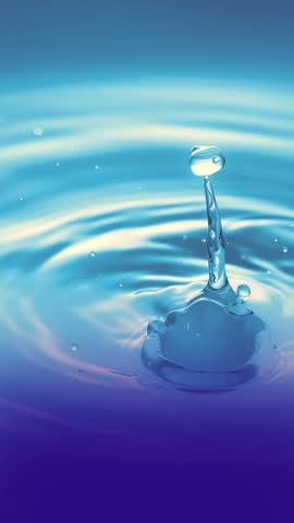 A single water droplet touches the water surface, creating a beautiful splash and delicate ripples in a captivating close-up.