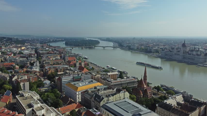Aerial view of the Hungarian Parliament Building and the Danube River flowing through the city of Budapest, Hungary.