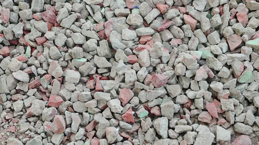 Crushed Concrete and Brick Rubble Gravel Texture Background Close Up