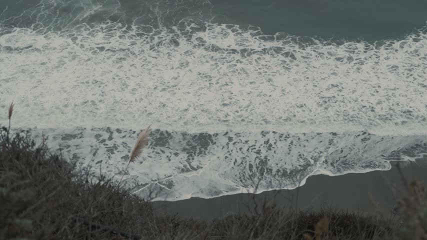 Waves Crashing on Rocky Shore at Dusk - Big Sur, California

