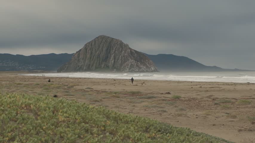 Morro Rock and Coastal Dunes with Beachgoers in Distance - Morro Bay, California
