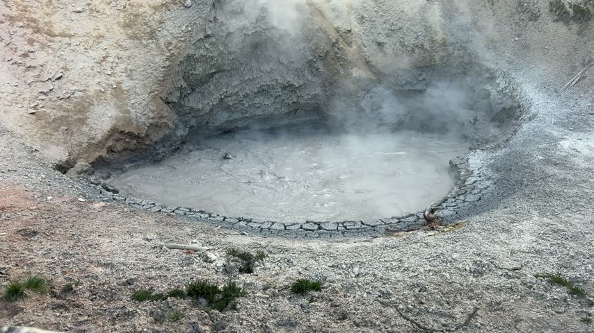 Yellowstone National Park - Boiling mud at Mud Volcano Area