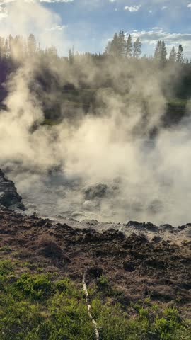 Yellowstone National Park - Boiling mud at Churning Caldron viewed from the Mud Volcano Trail	