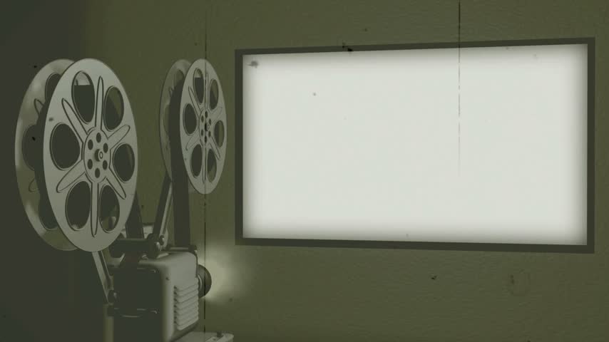 Vintage projector displaying The End text on a screen in dark room.