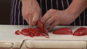 Chopping a red pepper