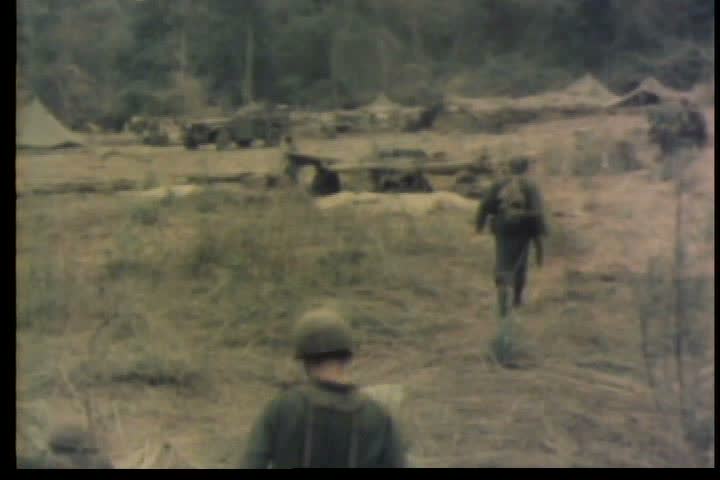 1960s - Members of an American armored cavalry unit move out during the Vietnam War