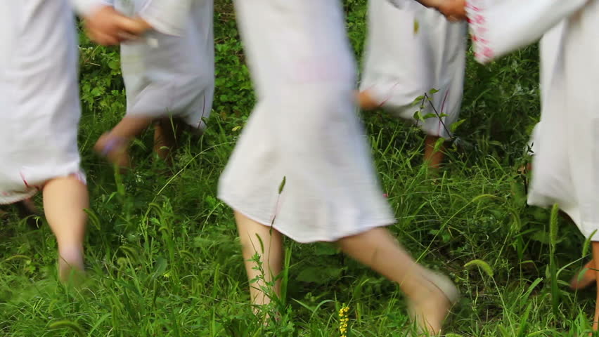 Fairies of the Forest / Young girls playing in the forest. They are dressed in