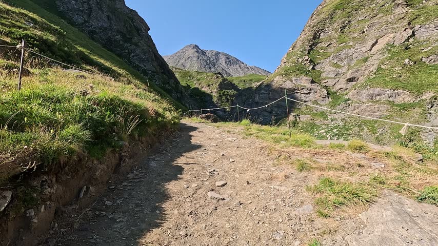 Rocky trail through a gorge on the climb toward the col, Valle Maira, Cottian Alps, Cuneo, Piedmont, Italy, Europe