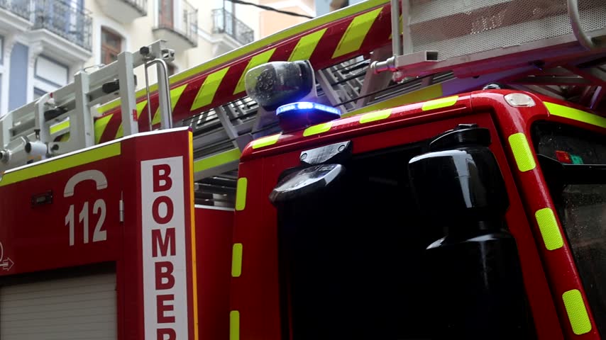 Stationary Fire Engine with Flashing Emergency Lights, Emergency Response Service