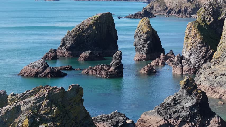 Follow the winding coastline of Waterford’s Copper Coast, where weathered rock formations, golden beaches and restless Atlantic waters create a striking landscape filled with colour, character and coa